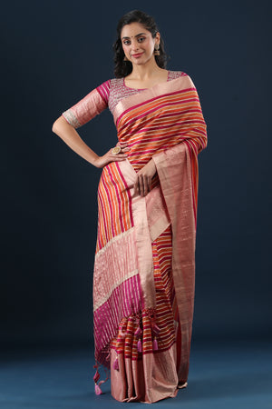 Buy multicolor striped tussar silk sari online in USA with zari border. Make a fashion statement at weddings with stunning designer sarees, embroidered sarees with blouse, wedding sarees, handloom sarees from Pure Elegance Indian fashion store in USA.-front