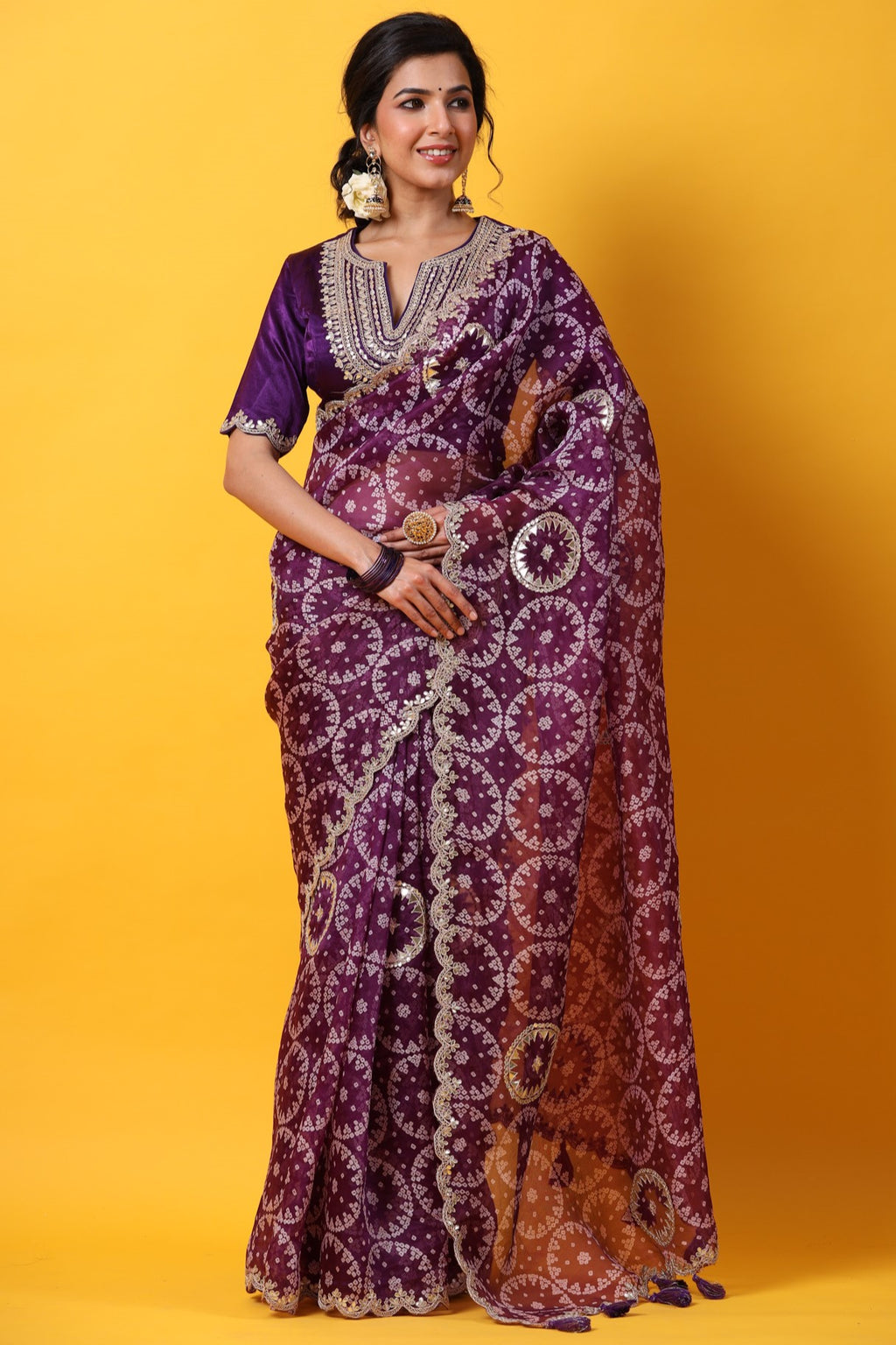 Shop purple printed organza sari online in USA with embroidered scalloped border. Make a fashion statement at weddings with stunning designer sarees, embroidered sarees with blouse, wedding sarees, handloom sarees from Pure Elegance Indian fashion store in USA.-full view