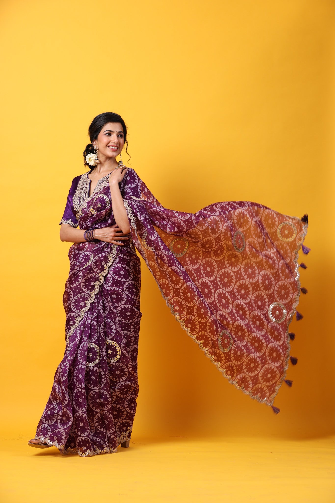 Shop purple printed organza sari online in USA with embroidered scalloped border. Make a fashion statement at weddings with stunning designer sarees, embroidered sarees with blouse, wedding sarees, handloom sarees from Pure Elegance Indian fashion store in USA.-pallu