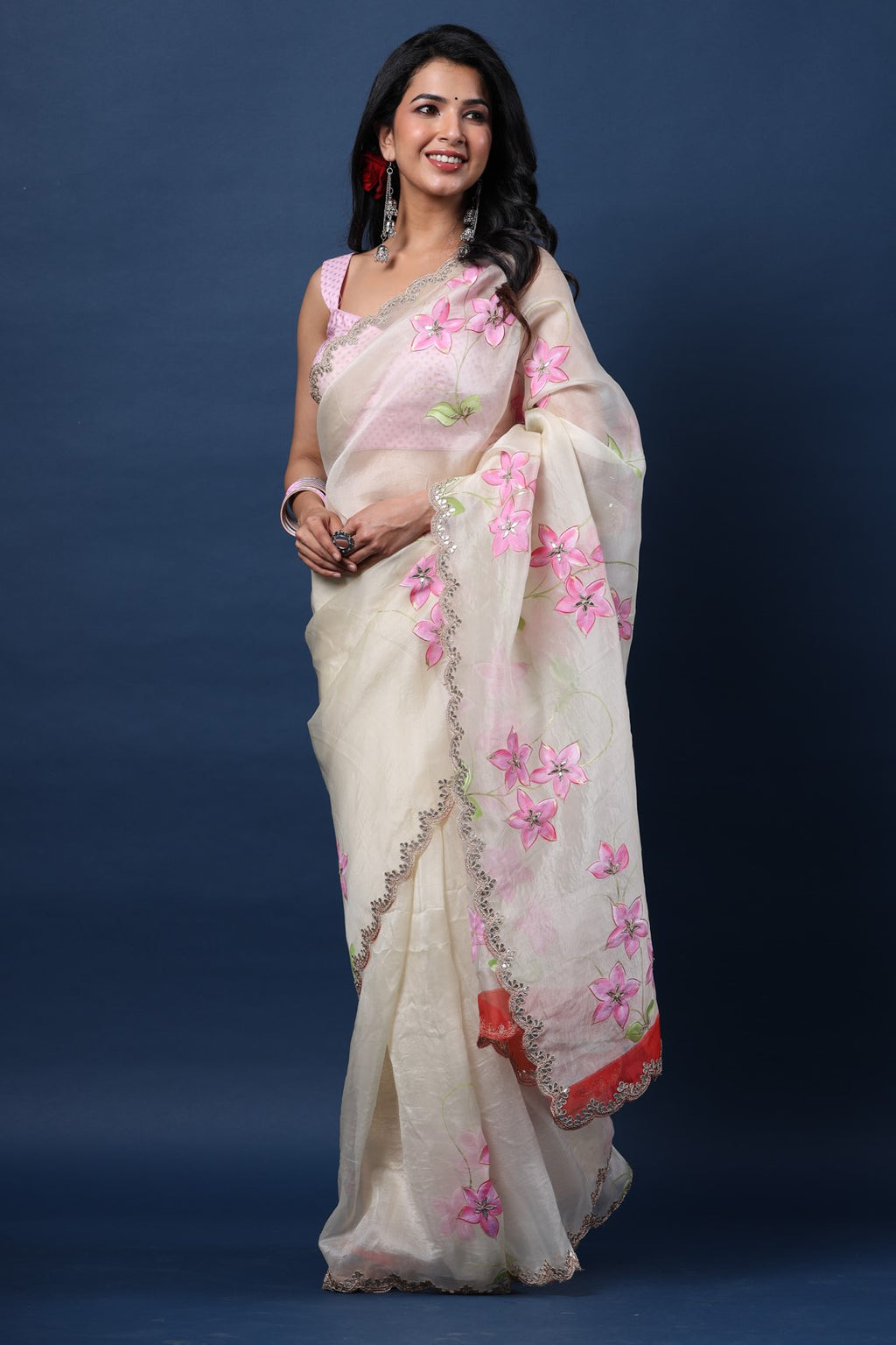 Shop beautiful white hand painted organza sari online in USA with embroidered scalloped border. Make a fashion statement at weddings with stunning designer sarees, embroidered sarees with blouse, wedding sarees, handloom sarees from Pure Elegance Indian fashion store in USA.-full view