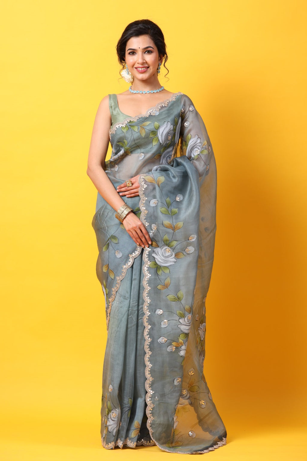 Buy beautiful grey hand painted organza sari online in USA with embroidered scalloped border. Make a fashion statement at weddings with stunning designer sarees, embroidered sarees with blouse, wedding sarees, handloom sarees from Pure Elegance Indian fashion store in USA.-full view
