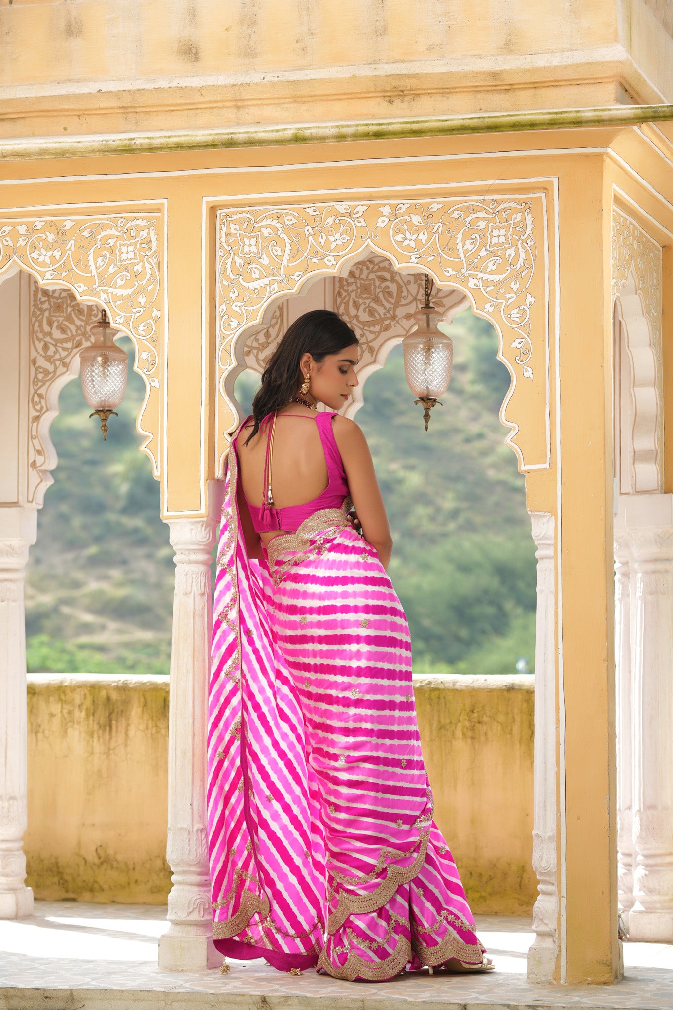 Shop pink striped tussar silk sari online in USA with embroidered scalloped border. Make a fashion statement at weddings with stunning designer sarees, embroidered sarees with blouse, wedding sarees, handloom sarees from Pure Elegance Indian fashion store in USA.-back