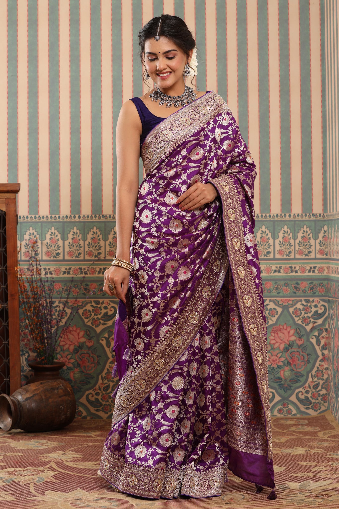 Buy purple heavy Banarasi sari online in USA with zari minakari work. Make a fashion statement at weddings with stunning designer sarees, embroidered sarees with blouse, wedding sarees, handloom sarees from Pure Elegance Indian fashion store in USA.-front