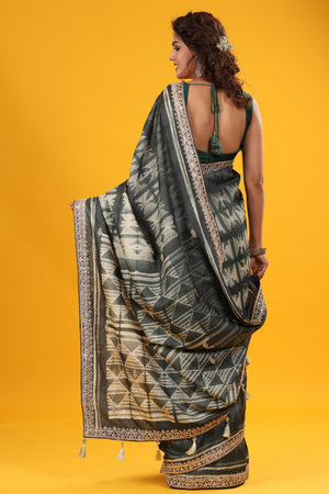 Buy grey printed tussar silk sari online in USA with embroidered border. Make a fashion statement at weddings with stunning designer sarees, embroidered sarees with blouse, wedding sarees, handloom sarees from Pure Elegance Indian fashion store in USA.-back