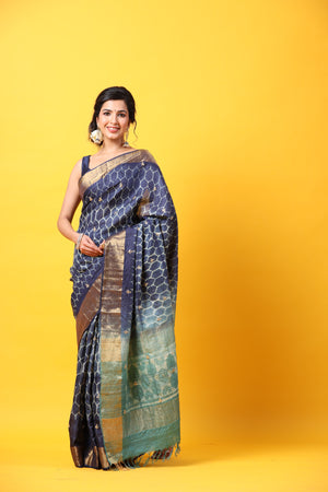 Shop blue printed tussar silk sari online in USA with zari border. Make a fashion statement at weddings with stunning designer sarees, embroidered sarees with blouse, wedding sarees, handloom sarees from Pure Elegance Indian fashion store in USA.-full view