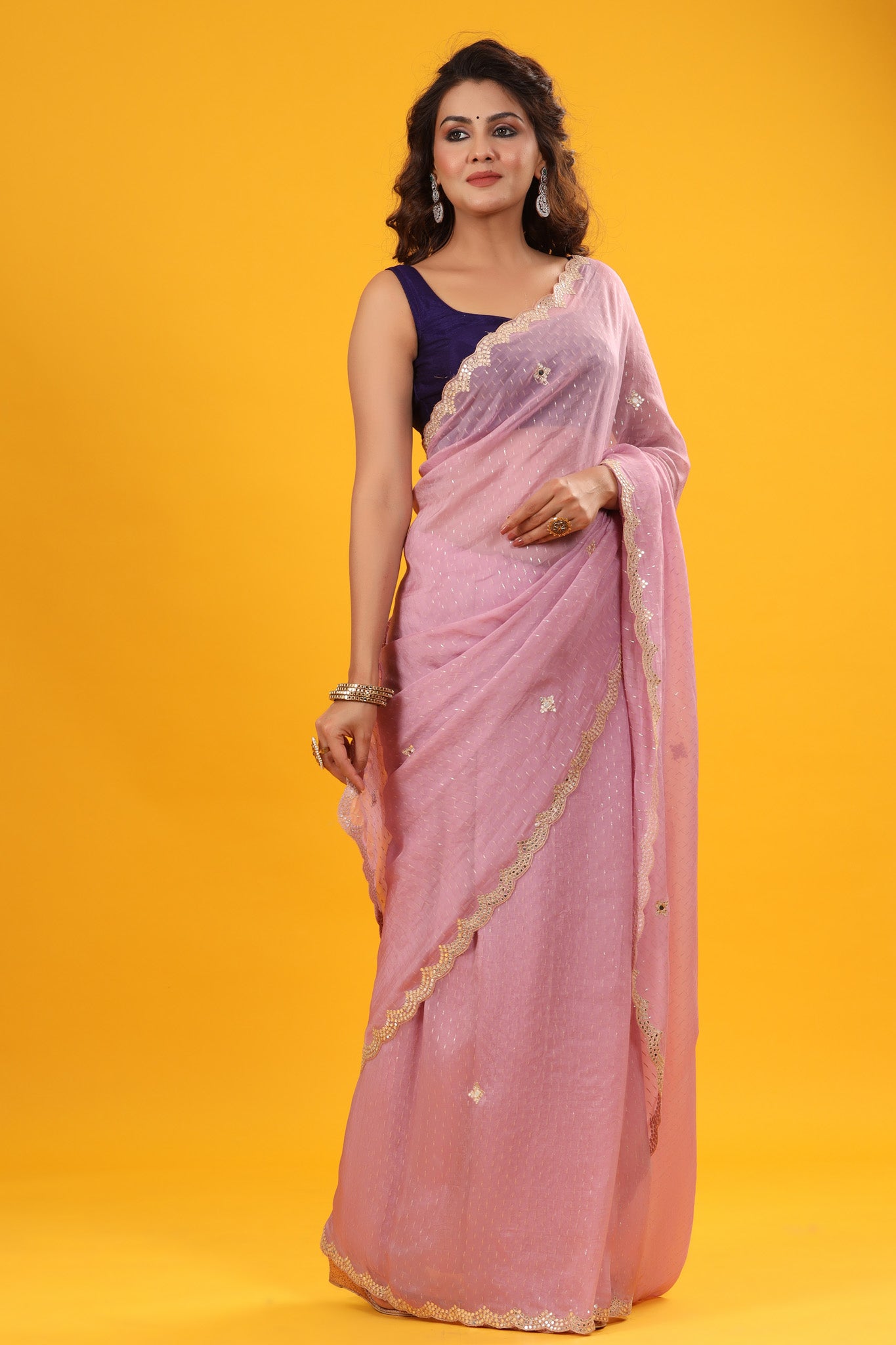 Shop light pink organza sari online in USA with scalloped border. Make a fashion statement at weddings with stunning designer sarees, embroidered sarees with blouse, wedding sarees, handloom sarees from Pure Elegance Indian fashion store in USA.-side