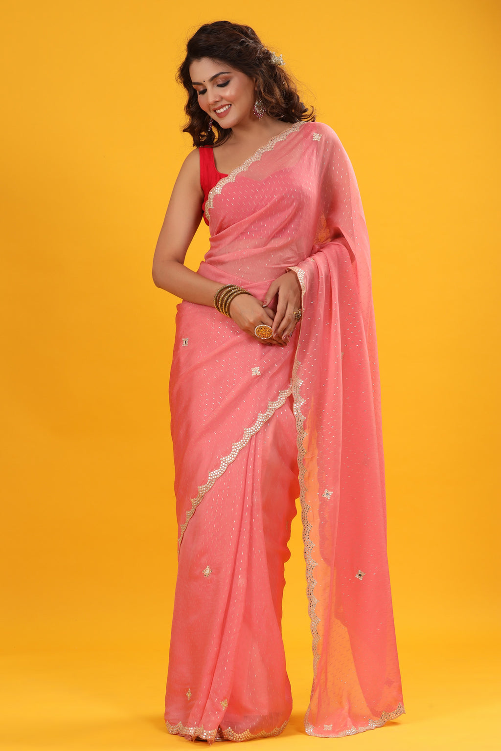 Buy pink organza sari online in USA with embroidered scalloped border. Make a fashion statement at weddings with stunning designer sarees, embroidered sarees with blouse, wedding sarees, handloom sarees from Pure Elegance Indian fashion store in USA.-full view
