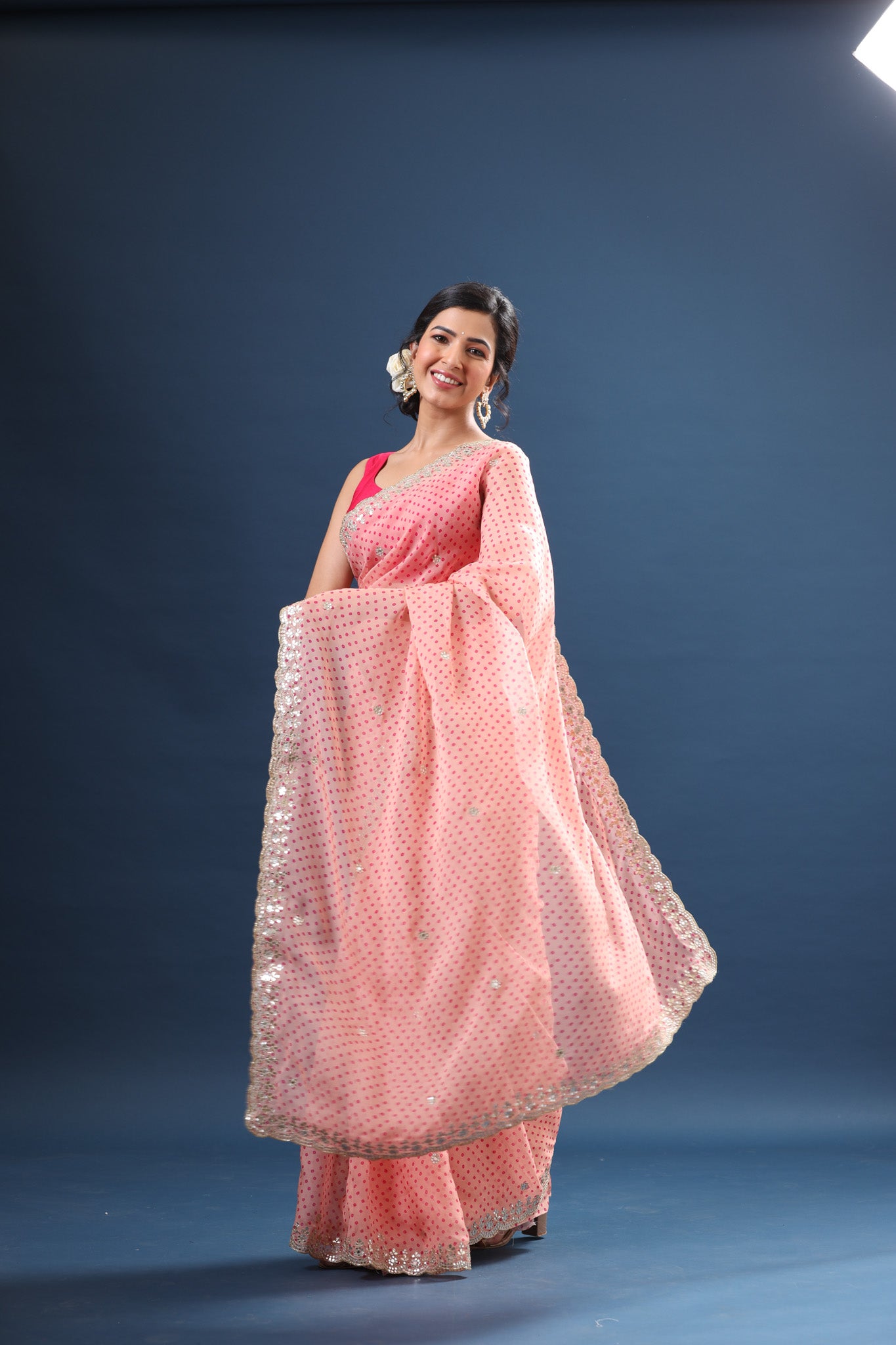 Buy powder pink bandhej organza sari online in USA with scalloped border. Make a fashion statement at weddings with stunning designer sarees, embroidered sarees with blouse, wedding sarees, handloom sarees from Pure Elegance Indian fashion store in USA.-saree