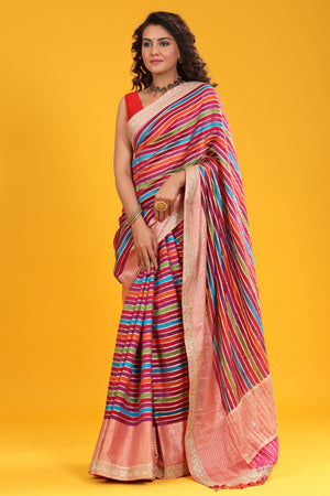 Buy multicolor tussar silk saree online in USA with embroidered zari border. Make a fashion statement at weddings with stunning designer sarees, embroidered sarees with blouse, wedding sarees, handloom sarees from Pure Elegance Indian fashion store in USA.-front