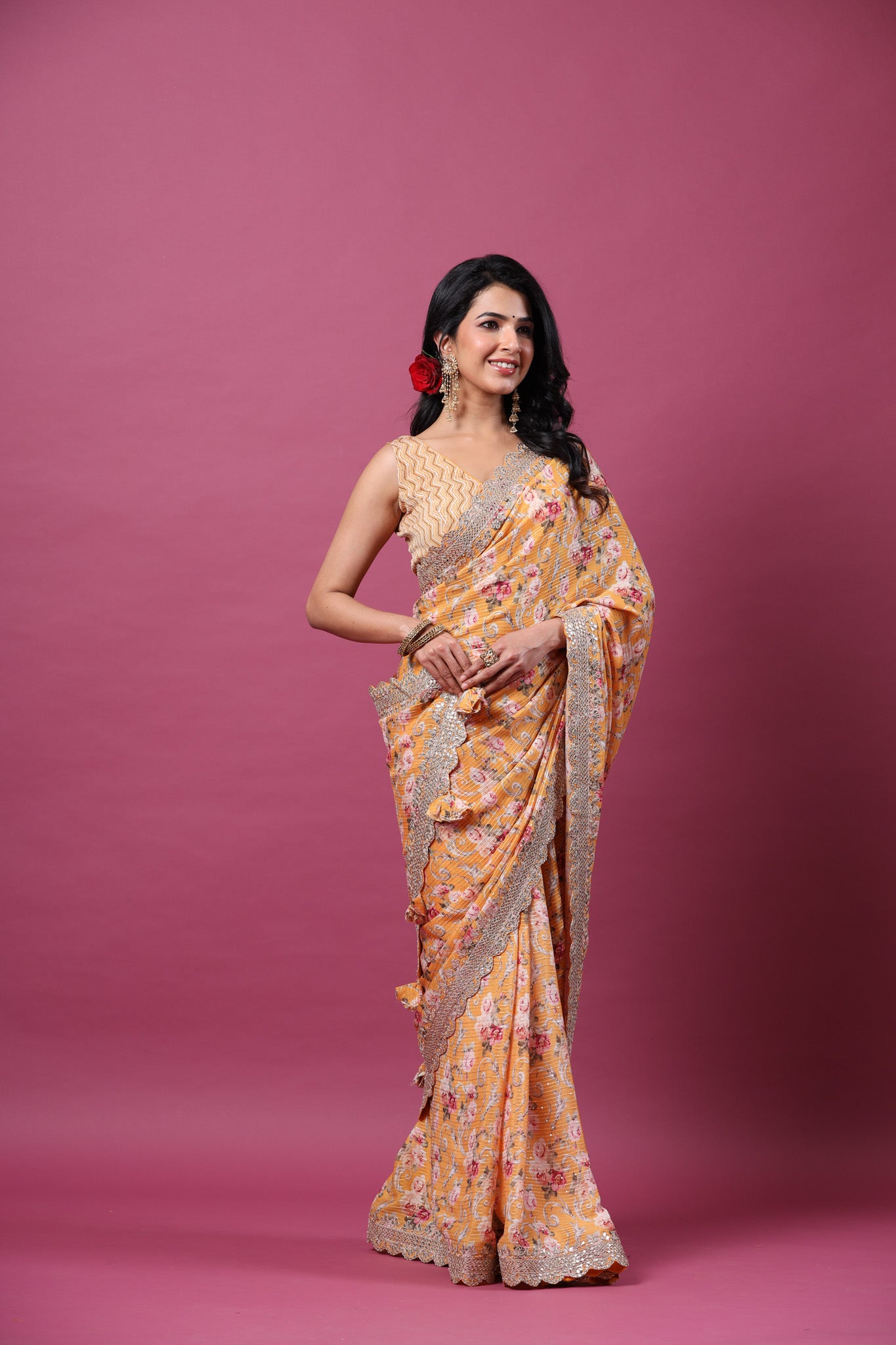 Shop yellow floral georgette saree online in USA with scalloped border. Make a fashion statement at weddings with stunning designer sarees, embroidered sarees with blouse, wedding sarees, handloom sarees from Pure Elegance Indian fashion store in USA.-saree