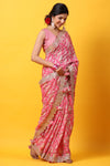 Shop light pink floral georgette saree online in USA with scalloped border. Make a fashion statement at weddings with stunning designer sarees, embroidered sarees with blouse, wedding sarees, handloom sarees from Pure Elegance Indian fashion store in USA.-full view