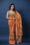 Shop orange embroidered floral organza silk saree online in USA with blouse. Make a fashion statement at weddings with stunning designer sarees, embroidered sarees with blouse, wedding sarees, handloom sarees from Pure Elegance Indian fashion store in USA.-full view