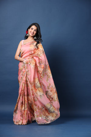 Buy light pink embroidered floral organza silk saree online in USA with blouse. Make a fashion statement at weddings with stunning designer sarees, embroidered sarees with blouse, wedding sarees, handloom sarees from Pure Elegance Indian fashion store in USA.-saree