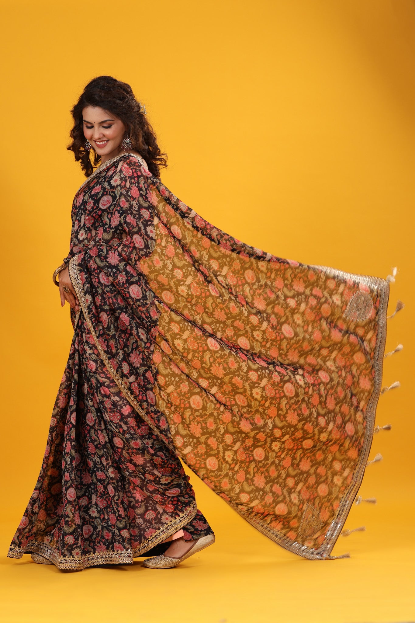 Buy black floral georgette saree online in USA with embroidered border. Make a fashion statement at weddings with stunning designer sarees, embroidered sarees with blouse, wedding sarees, handloom sarees from Pure Elegance Indian fashion store in USA.-pallu