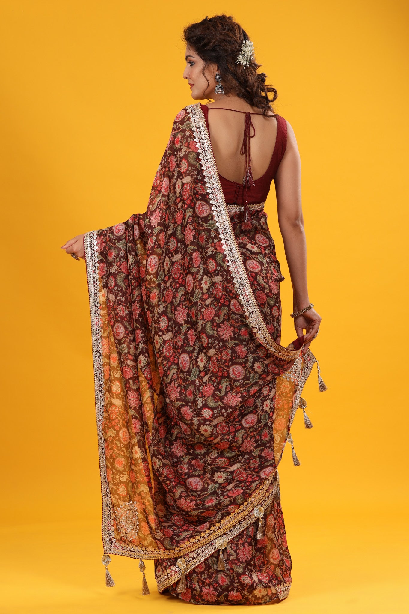 Shop beautiful maroon floral georgette saree online in USA with embroidered border. Make a fashion statement at weddings with stunning designer sarees, embroidered sarees with blouse, wedding sarees, handloom sarees from Pure Elegance Indian fashion store in USA.-back