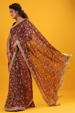 Shop beautiful maroon floral georgette saree online in USA with embroidered border. Make a fashion statement at weddings with stunning designer sarees, embroidered sarees with blouse, wedding sarees, handloom sarees from Pure Elegance Indian fashion store in USA.-pallu