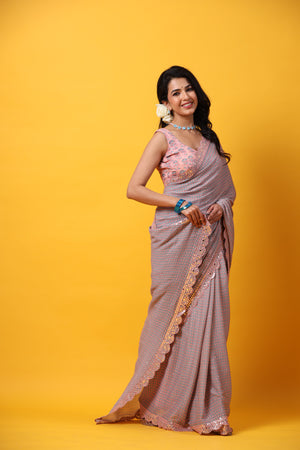 Buy pink blue multicolor printed georgette saree online in USA with scalloped border. Make a fashion statement at weddings with stunning designer sarees, embroidered sarees with blouse, wedding sarees, handloom sarees from Pure Elegance Indian fashion store in USA.-side