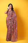 Shop pink multicolor printed georgette saree online in USA with scalloped border. Make a fashion statement at weddings with stunning designer sarees, embroidered sarees with blouse, wedding sarees, handloom sarees from Pure Elegance Indian fashion store in USA.-full view