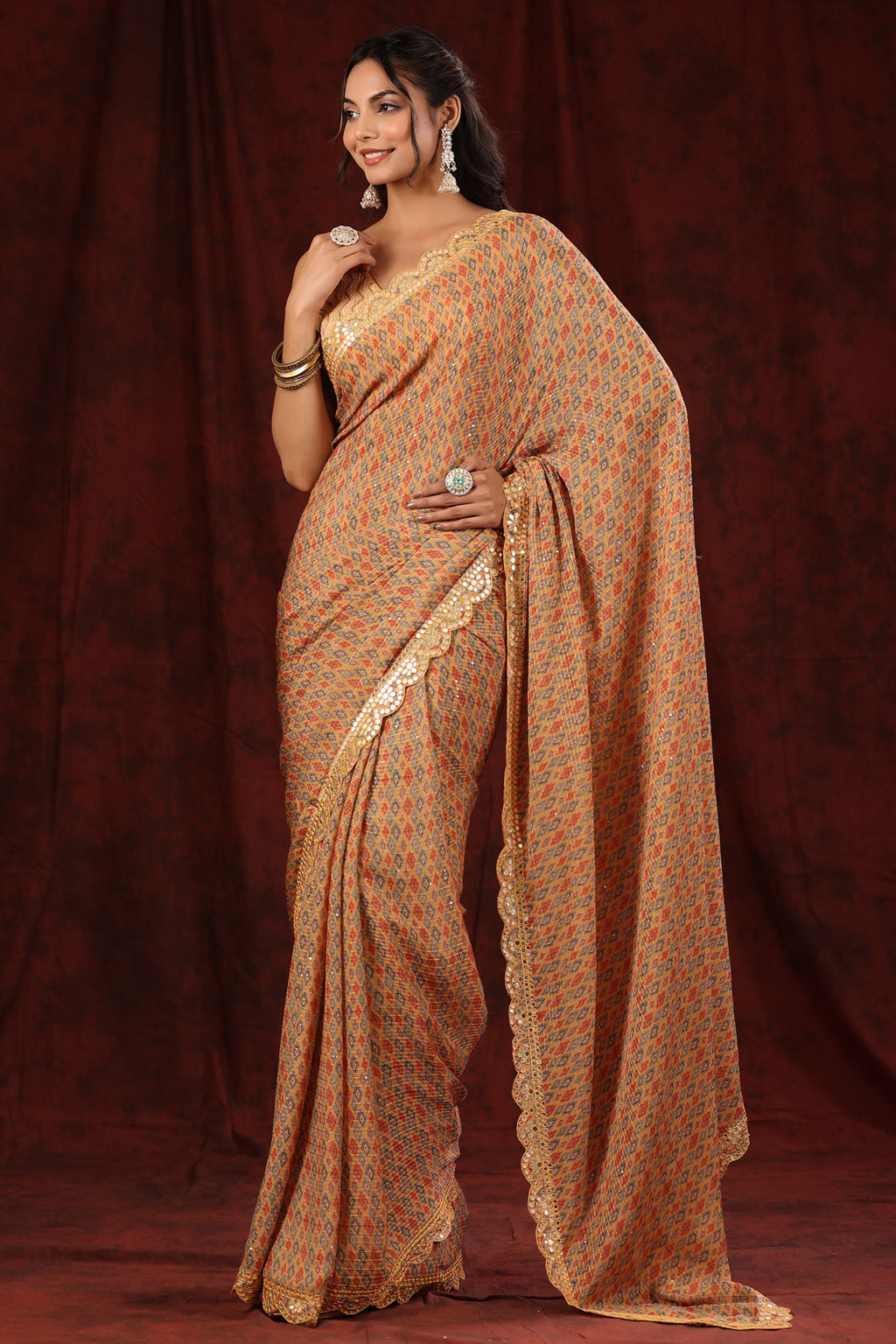Buy yellow georgette saree online in USA with scalloped border. Make a fashion statement at weddings with stunning designer sarees, embroidered sarees with blouse, wedding sarees, handloom sarees from Pure Elegance Indian fashion store in USA.-full view