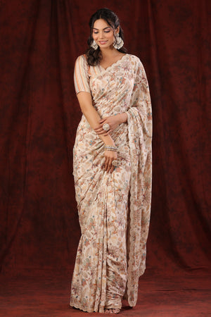 Shop cream floral print embroidered crepe georgette saree online in USA with blouse. Make a fashion statement at weddings with stunning designer sarees, embroidered sarees with blouse, wedding sarees, handloom sarees from Pure Elegance Indian fashion store in USA.-front