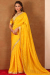 Buy yellow embroidered Banarasi Khaddi saree online in USA with blouse. Make a fashion statement at weddings with stunning designer sarees, embroidered sarees with blouse, wedding sarees, handloom sarees from Pure Elegance Indian fashion store in USA.-full view