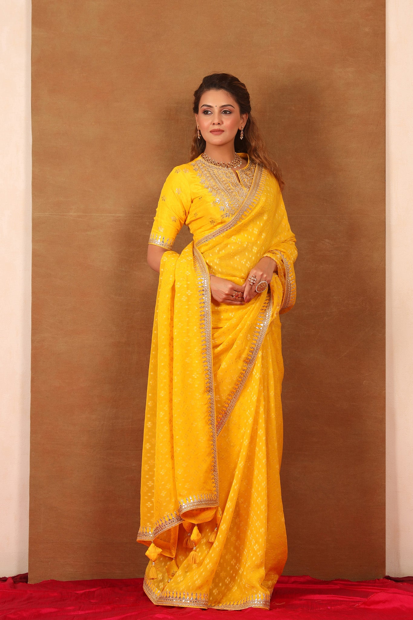 Buy yellow embroidered Banarasi Khaddi saree online in USA with blouse. Make a fashion statement at weddings with stunning designer sarees, embroidered sarees with blouse, wedding sarees, handloom sarees from Pure Elegance Indian fashion store in USA.-front