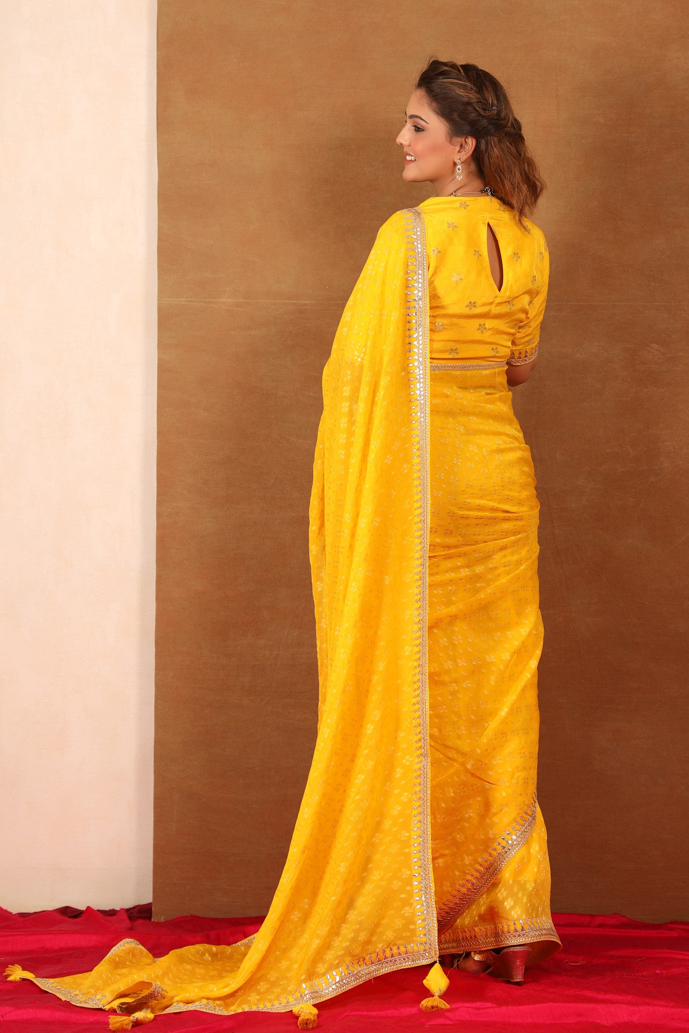 Buy yellow embroidered Banarasi Khaddi saree online in USA with blouse. Make a fashion statement at weddings with stunning designer sarees, embroidered sarees with blouse, wedding sarees, handloom sarees from Pure Elegance Indian fashion store in USA.-back