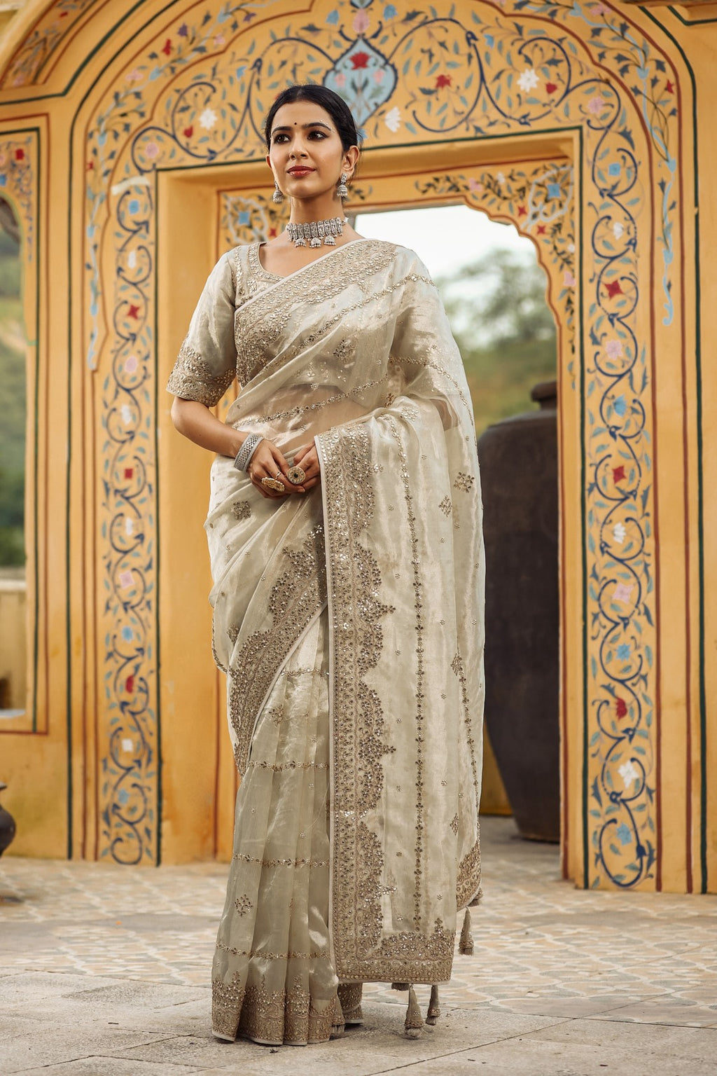 Buy silver embroidered organza silk saree online in USA with blouse. Make a fashion statement at weddings with stunning designer sarees, embroidered sarees with blouse, wedding sarees, handloom sarees from Pure Elegance Indian fashion store in USA.-full view