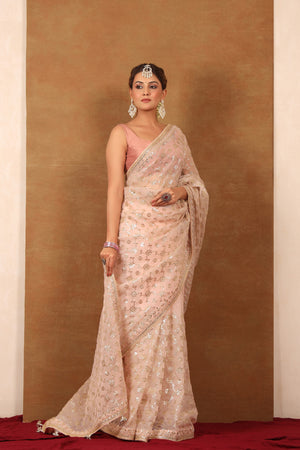 Buy powder pink embroidered organza silk saree online in USA with blouse. Make a fashion statement at weddings with stunning designer sarees, embroidered sarees with blouse, wedding sarees, handloom sarees from Pure Elegance Indian fashion store in USA.-side