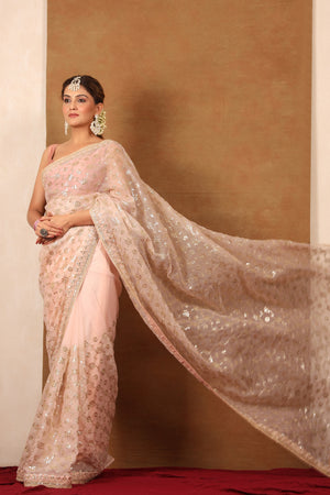 Buy powder pink embroidered organza silk saree online in USA with blouse. Make a fashion statement at weddings with stunning designer sarees, embroidered sarees with blouse, wedding sarees, handloom sarees from Pure Elegance Indian fashion store in USA.-pallu
