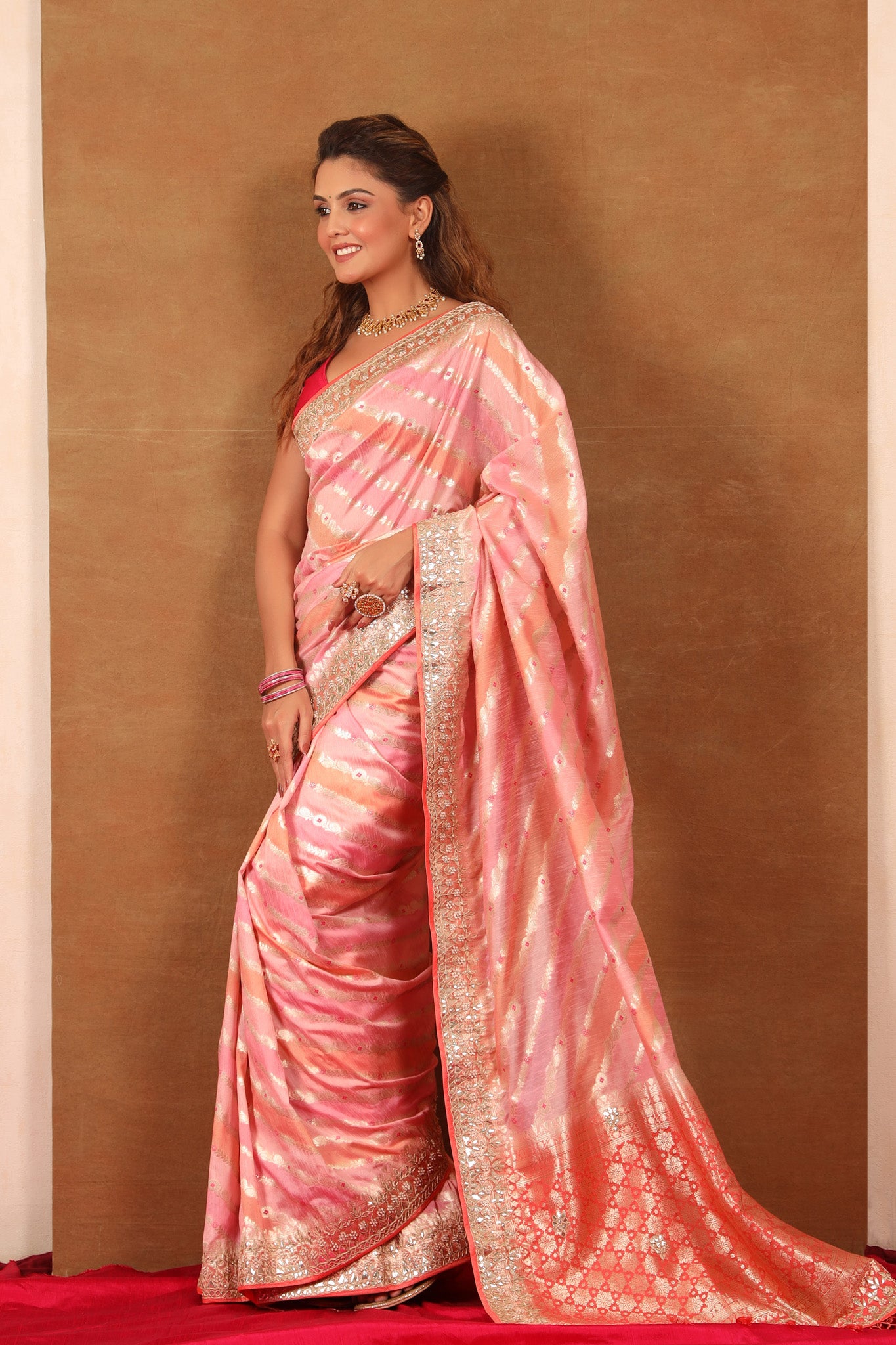 Buy beautiful pastel pink and peach embroidered georgette saree online in USA. Make a fashion statement at weddings with stunning designer sarees, embroidered sarees with blouse, wedding sarees, handloom sarees from Pure Elegance Indian fashion store in USA.-pallu