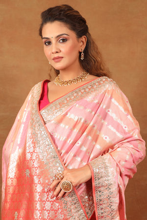 Buy beautiful pastel pink and peach embroidered georgette saree online in USA. Make a fashion statement at weddings with stunning designer sarees, embroidered sarees with blouse, wedding sarees, handloom sarees from Pure Elegance Indian fashion store in USA.-closeup