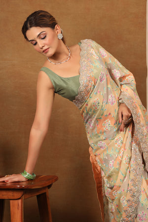 Buy cream and grey embroidered georgette Banarasi saree online in USA with blouse. Make a fashion statement at weddings with stunning designer sarees, embroidered sarees with blouse, wedding sarees, handloom sarees from Pure Elegance Indian fashion store in USA.-side