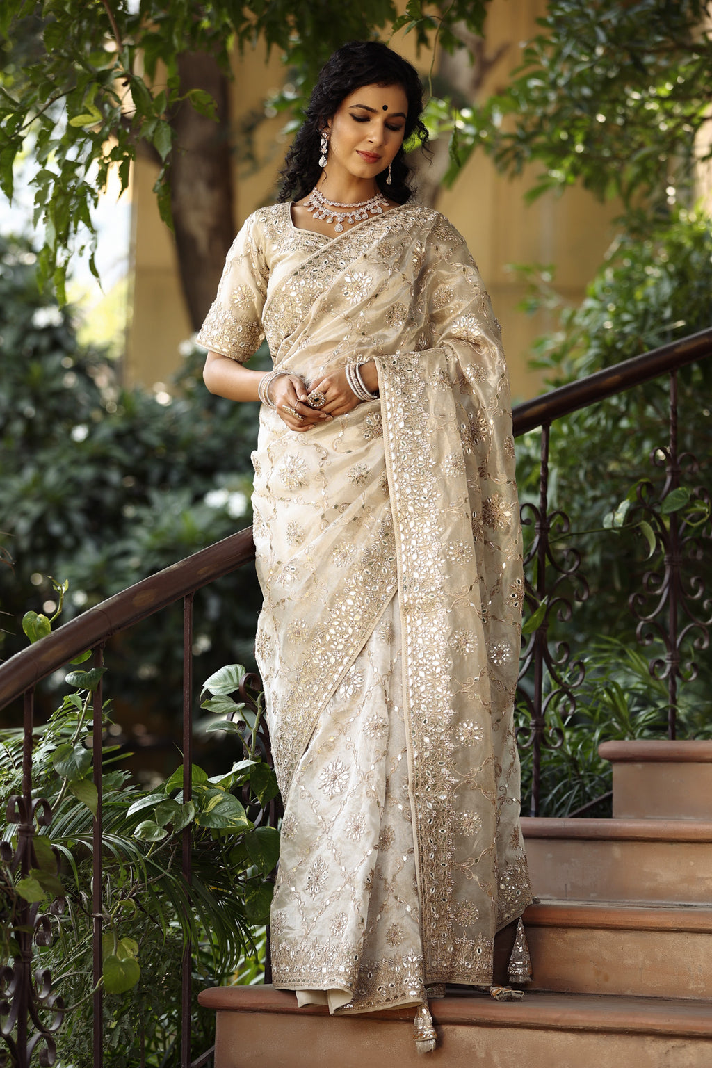 Shop cream heavy embroidery organza silk saree online in USA with blouse. Make a fashion statement at weddings with stunning designer sarees, embroidered sarees with blouse, wedding sarees, handloom sarees from Pure Elegance Indian fashion store in USA.-full view