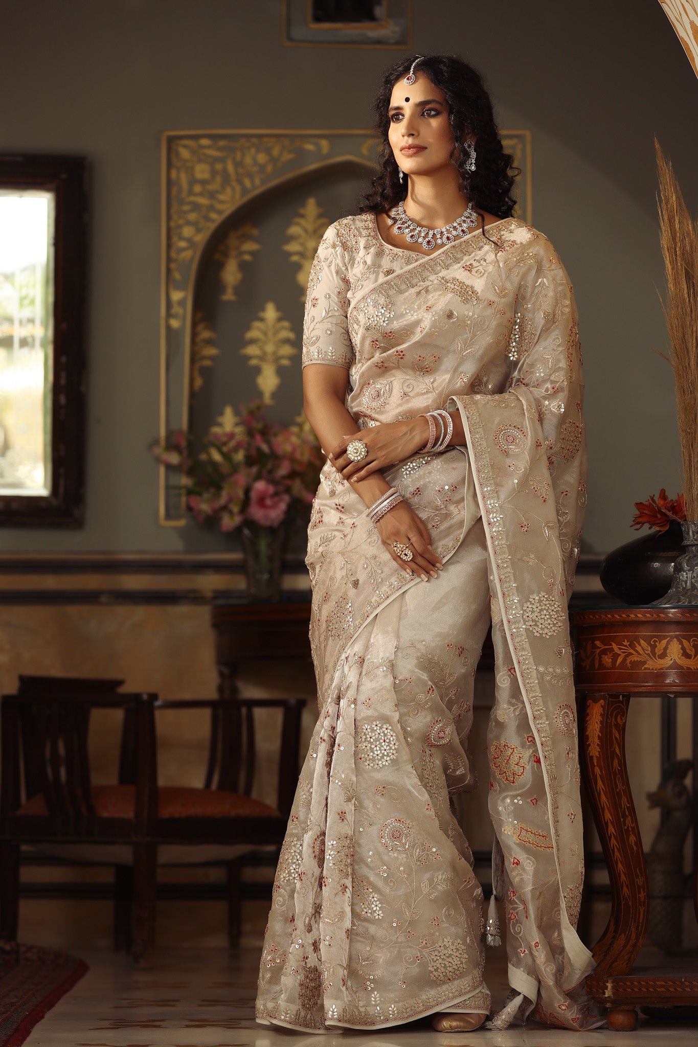Buy cream embroidered organza silk saree online in USA with blouse. Make a fashion statement at weddings with stunning designer sarees, embroidered sarees with blouse, wedding sarees, handloom sarees from Pure Elegance Indian fashion store in USA.-front