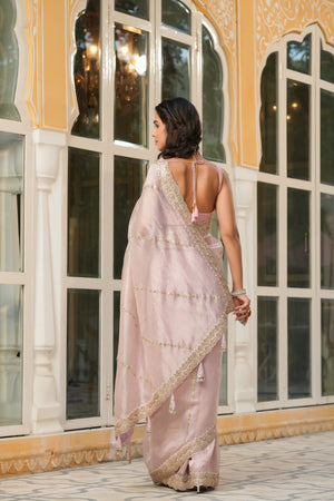 Shop powder pink embroidered organza silk saree online in USA with blouse. Make a fashion statement at weddings with stunning designer sarees, embroidered sarees with blouse, wedding sarees, handloom sarees from Pure Elegance Indian fashion store in USA.-back