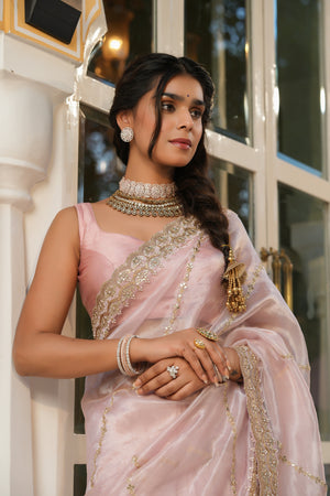 Shop powder pink embroidered organza silk saree online in USA with blouse. Make a fashion statement at weddings with stunning designer sarees, embroidered sarees with blouse, wedding sarees, handloom sarees from Pure Elegance Indian fashion store in USA.-closeup