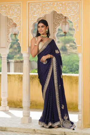 Buy beautiful navy blue embroidered tussar georgette saree online in USA with blouse. Make a fashion statement at weddings with stunning designer sarees, embroidered sarees with blouse, wedding sarees, handloom sarees from Pure Elegance Indian fashion store in USA.-side