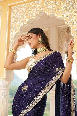 Buy beautiful navy blue embroidered tussar georgette saree online in USA with blouse. Make a fashion statement at weddings with stunning designer sarees, embroidered sarees with blouse, wedding sarees, handloom sarees from Pure Elegance Indian fashion store in USA.-closeup