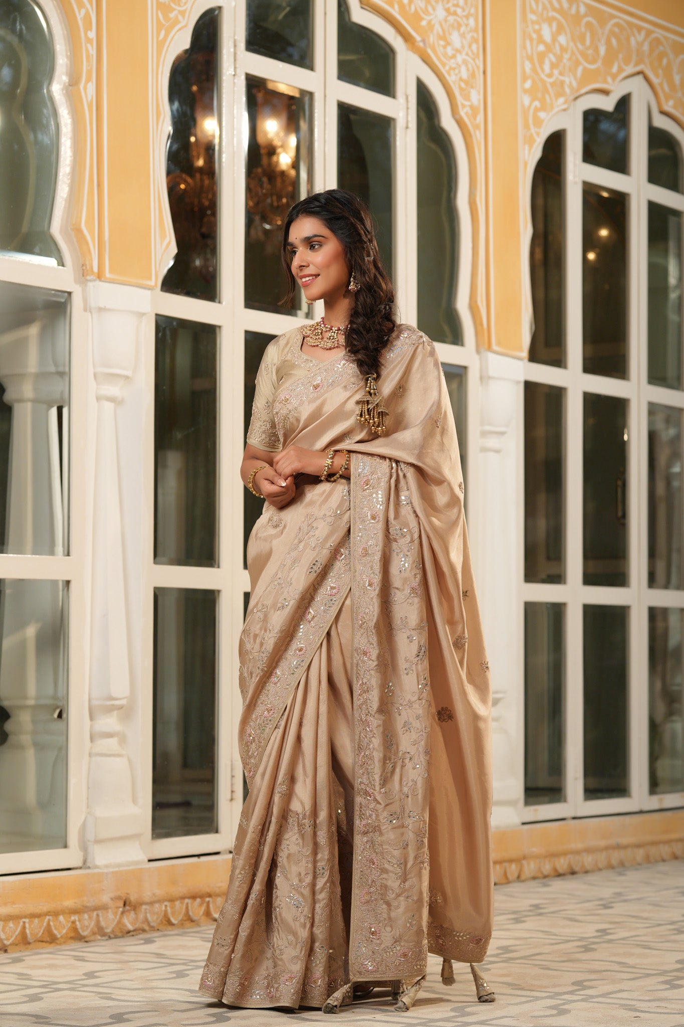 Shop beige tussar georgette saree online in USA with embroidered border. Make a fashion statement at weddings with stunning designer sarees, embroidered sarees with blouse, wedding sarees, handloom sarees from Pure Elegance Indian fashion store in USA.-pallu