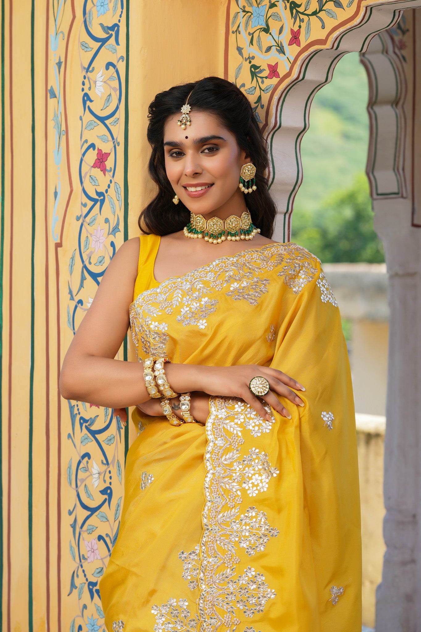 Buy yellow tussar georgette saree online in USA with embroidered border. Make a fashion statement at weddings with stunning designer sarees, embroidered sarees with blouse, wedding sarees, handloom sarees from Pure Elegance Indian fashion store in USA.-closeup