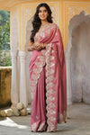 Shop beautiful dusty pink tussar georgette saree online in USA with embroidered border. Make a fashion statement at weddings with stunning designer sarees, embroidered sarees with blouse, wedding sarees, handloom sarees from Pure Elegance Indian fashion store in USA.-full view