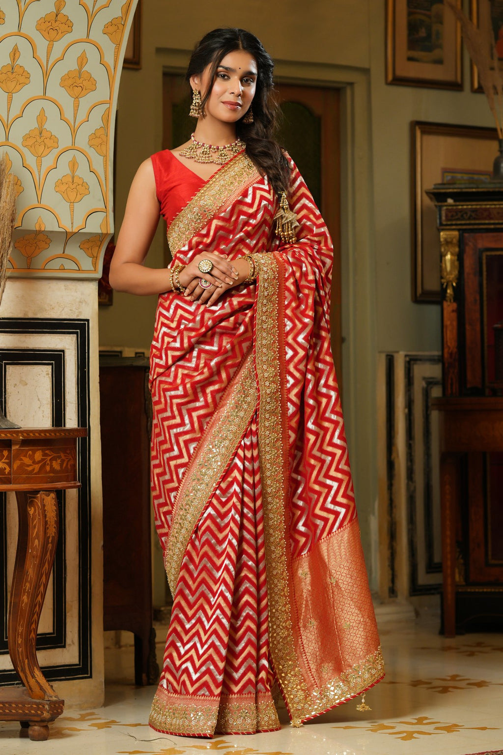 Buy red embroidered georgette Banarasi saree online in USA with embroidered blouse. Make a fashion statement at weddings with stunning designer sarees, embroidered sarees with blouse, wedding sarees, handloom sarees from Pure Elegance Indian fashion store in USA.-full view