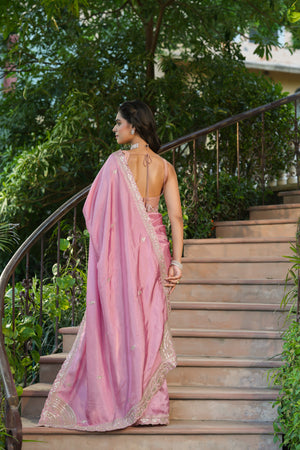 Buy light pink tussar georgette saree online in USA with embroidered blouse. Make a fashion statement at weddings with stunning designer sarees, embroidered sarees with blouse, wedding sarees, handloom sarees from Pure Elegance Indian fashion store in USA.-back
