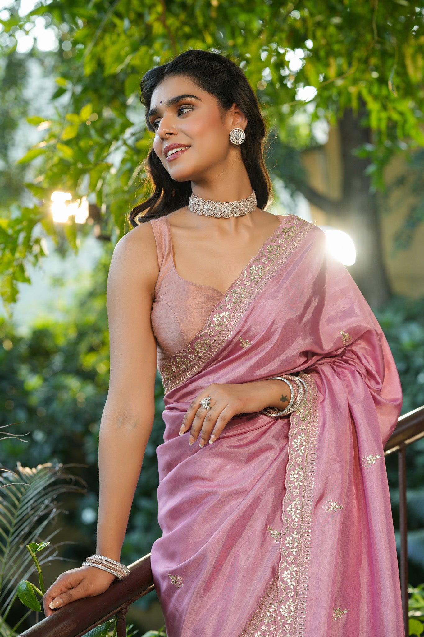 Buy light pink tussar georgette saree online in USA with embroidered blouse. Make a fashion statement at weddings with stunning designer sarees, embroidered sarees with blouse, wedding sarees, handloom sarees from Pure Elegance Indian fashion store in USA.-closeup