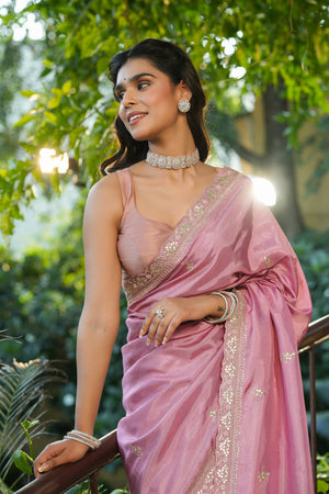 Buy light pink tussar georgette saree online in USA with embroidered blouse. Make a fashion statement at weddings with stunning designer sarees, embroidered sarees with blouse, wedding sarees, handloom sarees from Pure Elegance Indian fashion store in USA.-closeup