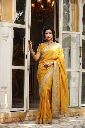 Buy yellow tussar georgette saree online in USA with embroidered blouse. Make a fashion statement at weddings with stunning designer sarees, embroidered sarees with blouse, wedding sarees, handloom sarees from Pure Elegance Indian fashion store in USA.-front