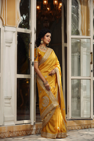 Buy yellow tussar georgette saree online in USA with embroidered blouse. Make a fashion statement at weddings with stunning designer sarees, embroidered sarees with blouse, wedding sarees, handloom sarees from Pure Elegance Indian fashion store in USA.-side