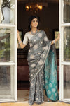 Shop beautiful grey tussar georgette saree online in USA with embroidered blouse. Make a fashion statement at weddings with stunning designer sarees, embroidered sarees with blouse, wedding sarees, handloom sarees from Pure Elegance Indian fashion store in USA.-full view