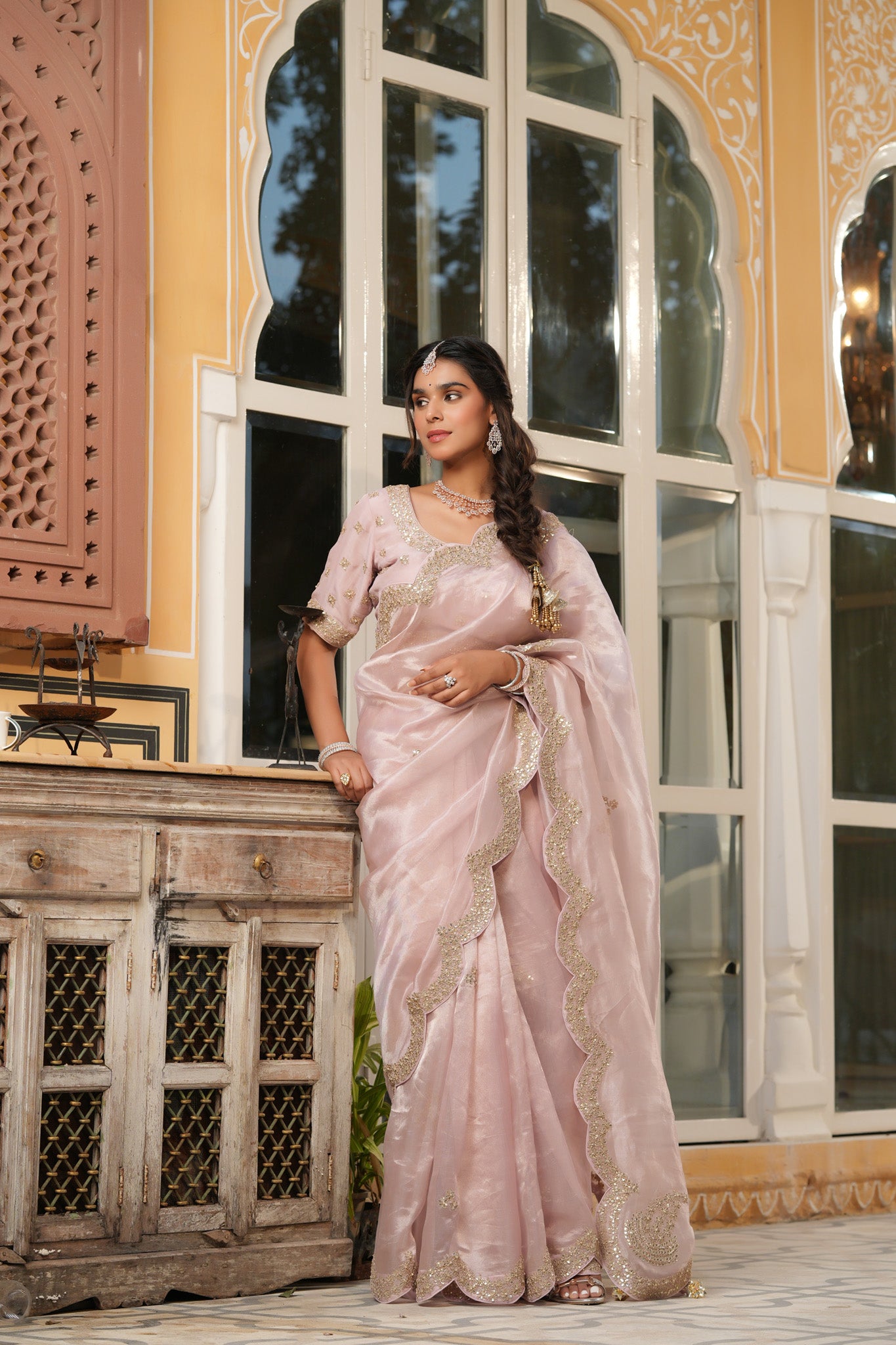 Shop powder pink tissue silk saree online in USA with scalloped border. Make a fashion statement at weddings with stunning designer sarees, embroidered sarees with blouse, wedding sarees, handloom sarees from Pure Elegance Indian fashion store in USA.-saree